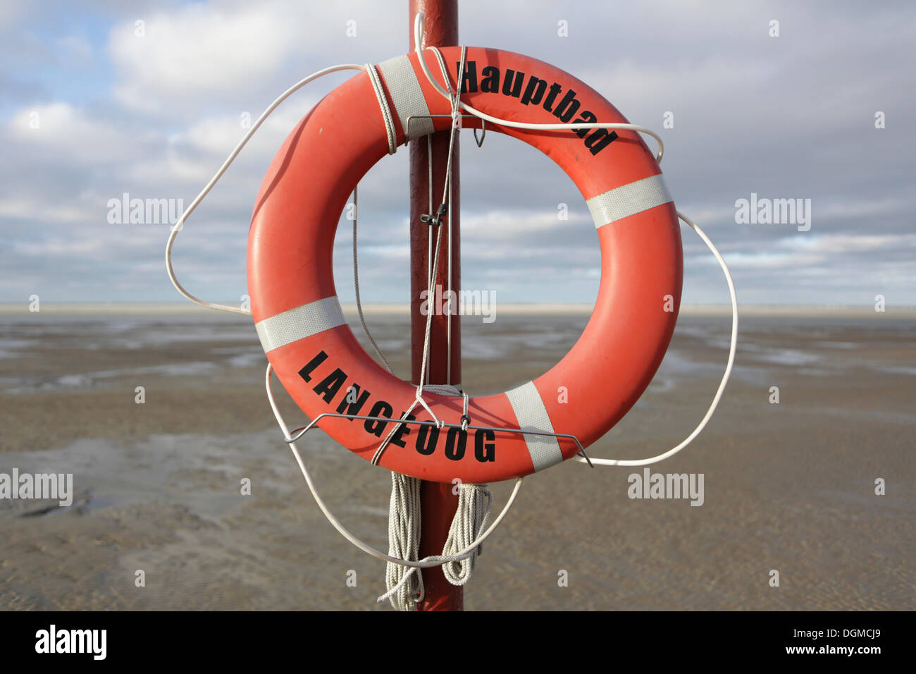 Lifebuoy on the main beach, Langeoog, Ostfriesische Inseln, Lower Saxony, Germany Stock Photo