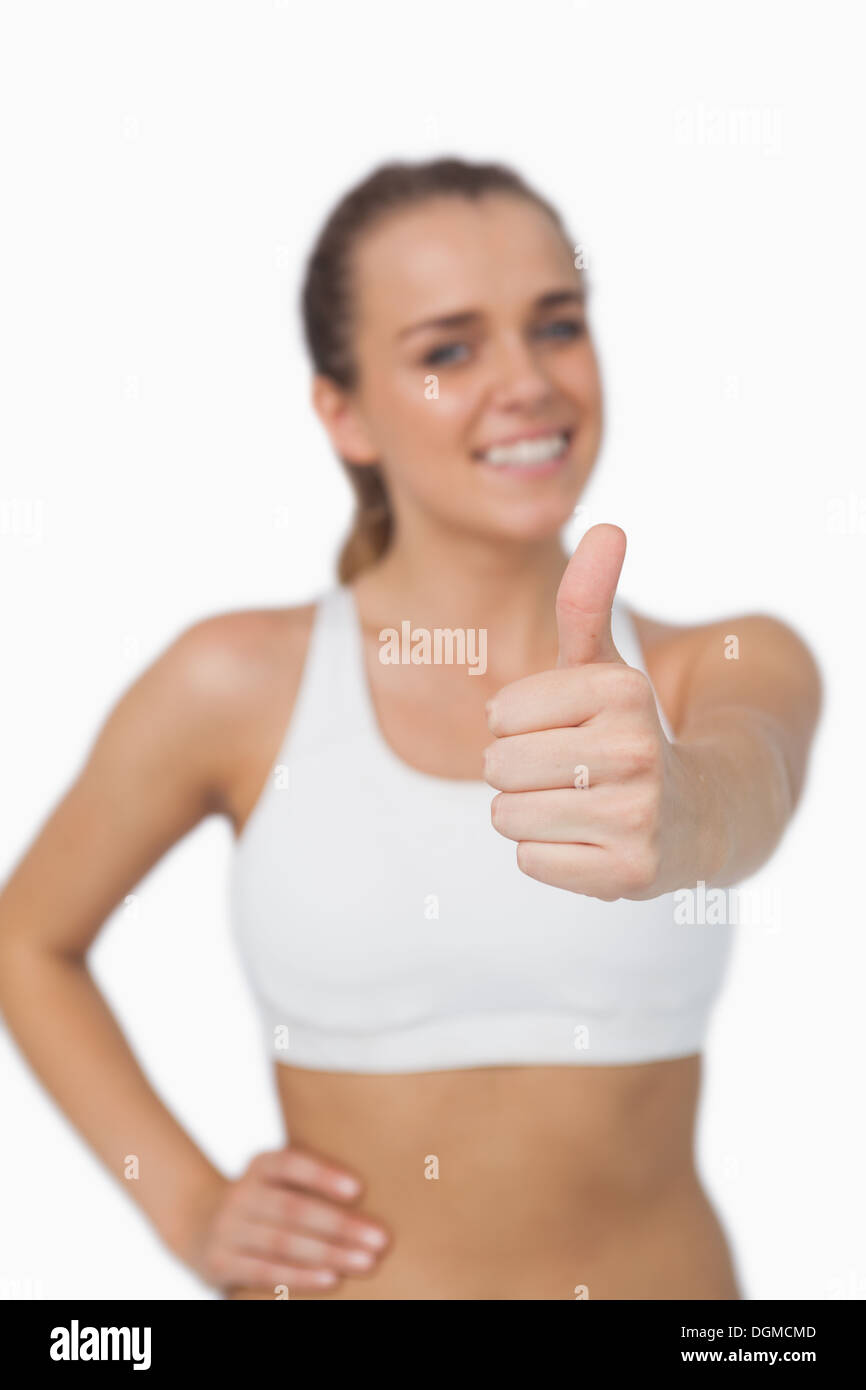 Content pretty woman showing thumbs up Stock Photo