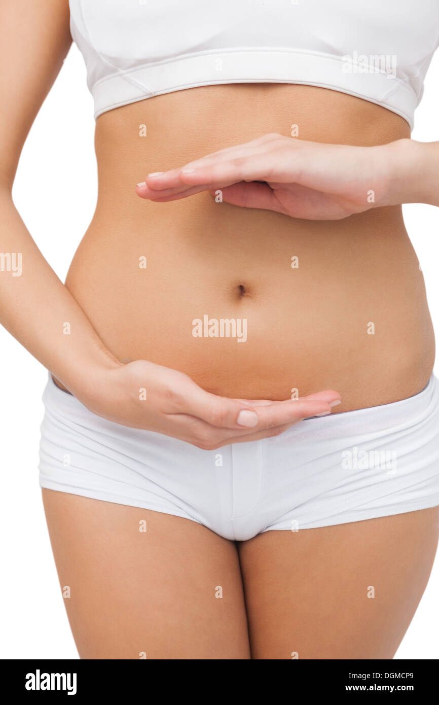 Close up of slim woman presenting with her hands Stock Photo