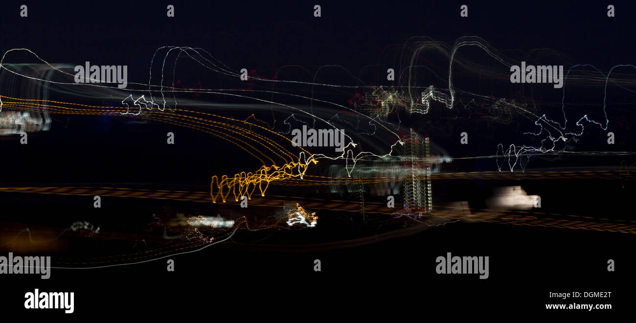 Moving lights at night with camera movements Stock Photo
