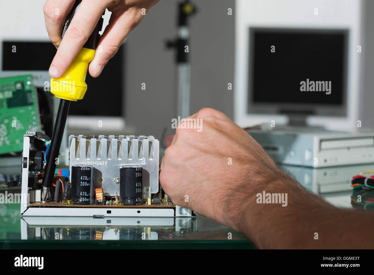 Computer engineer repairing hardware with screw driver Stock Photo Alamy