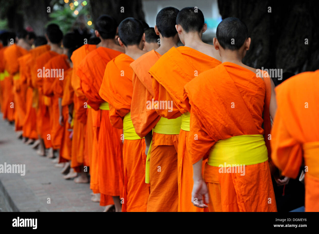 Morning begging for alms of the Buddhist monks, Luang Prabang, Laos, Southeast Asia, Asia Stock Photo