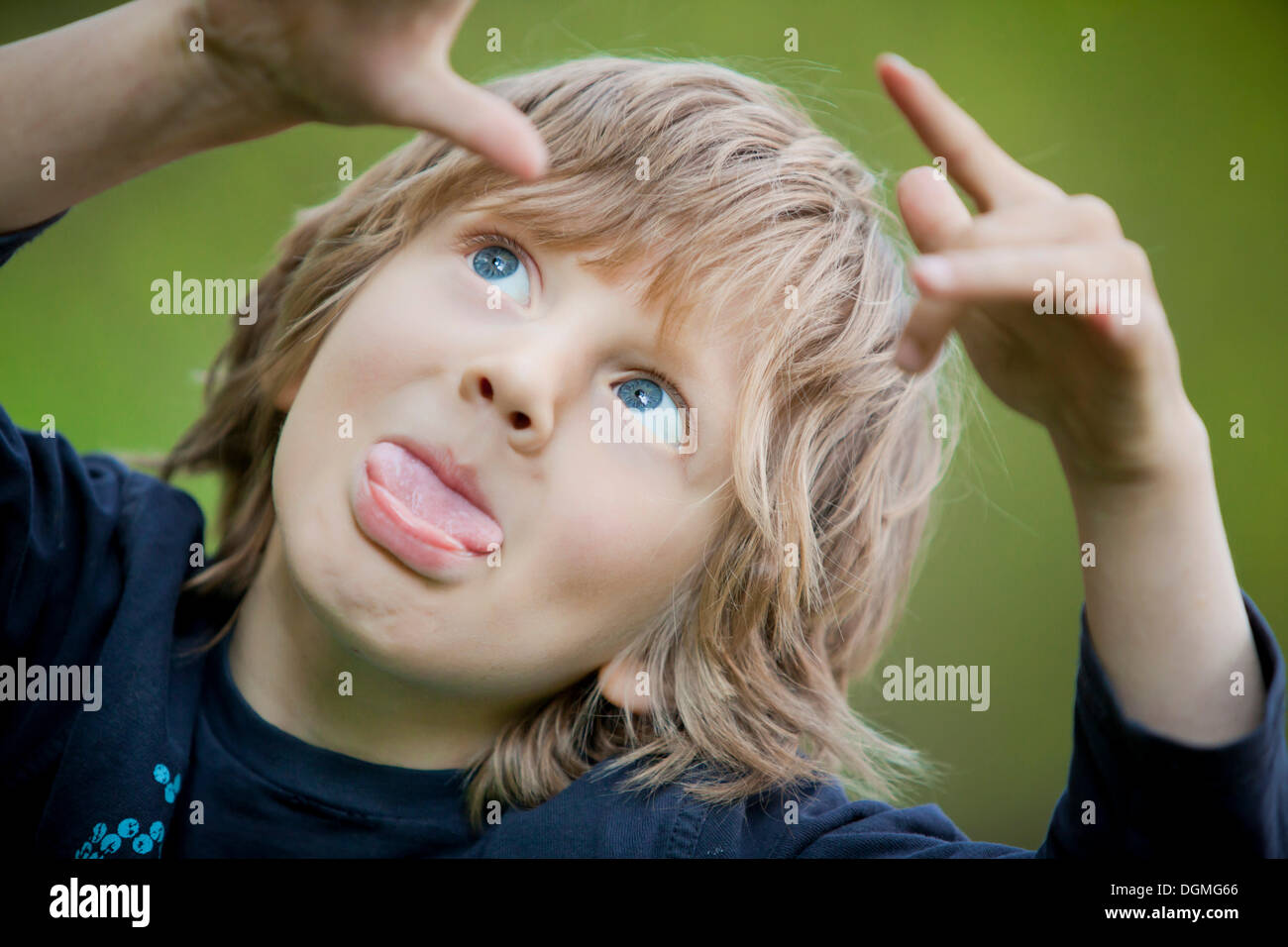 Boy, 5, making grimaces Stock Photo - Alamy
