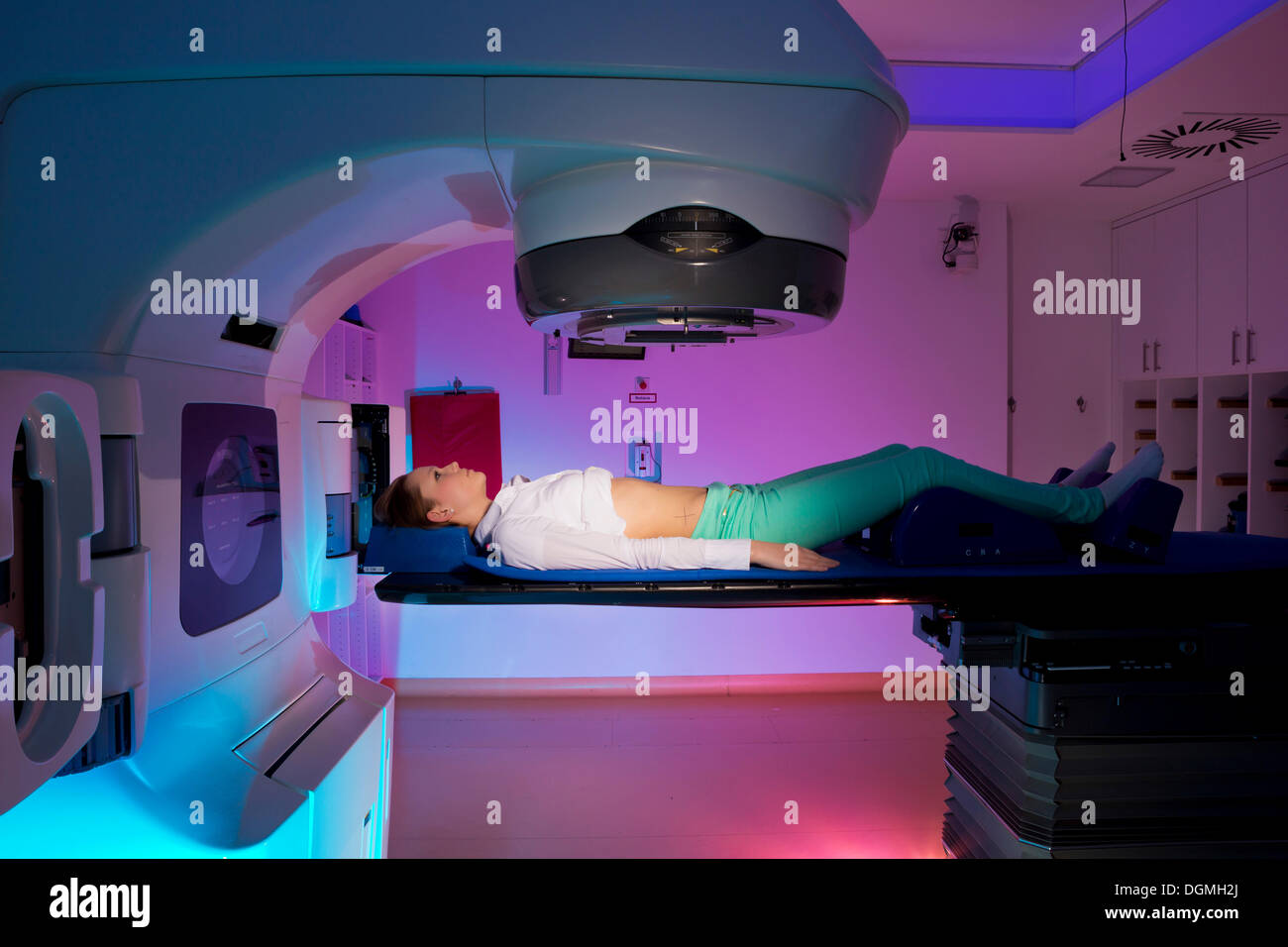 Patient lying in a linear particle accelerator for radiation treatment ...