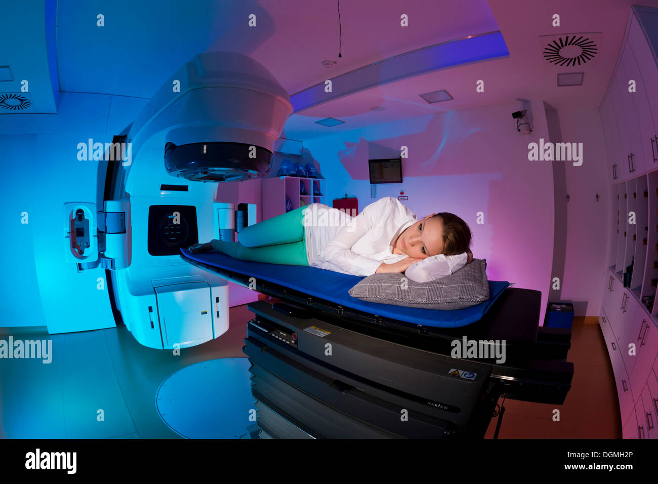 Patient lying in a linear particle accelerator for radiation treatment of the foot, Germany Stock Photo