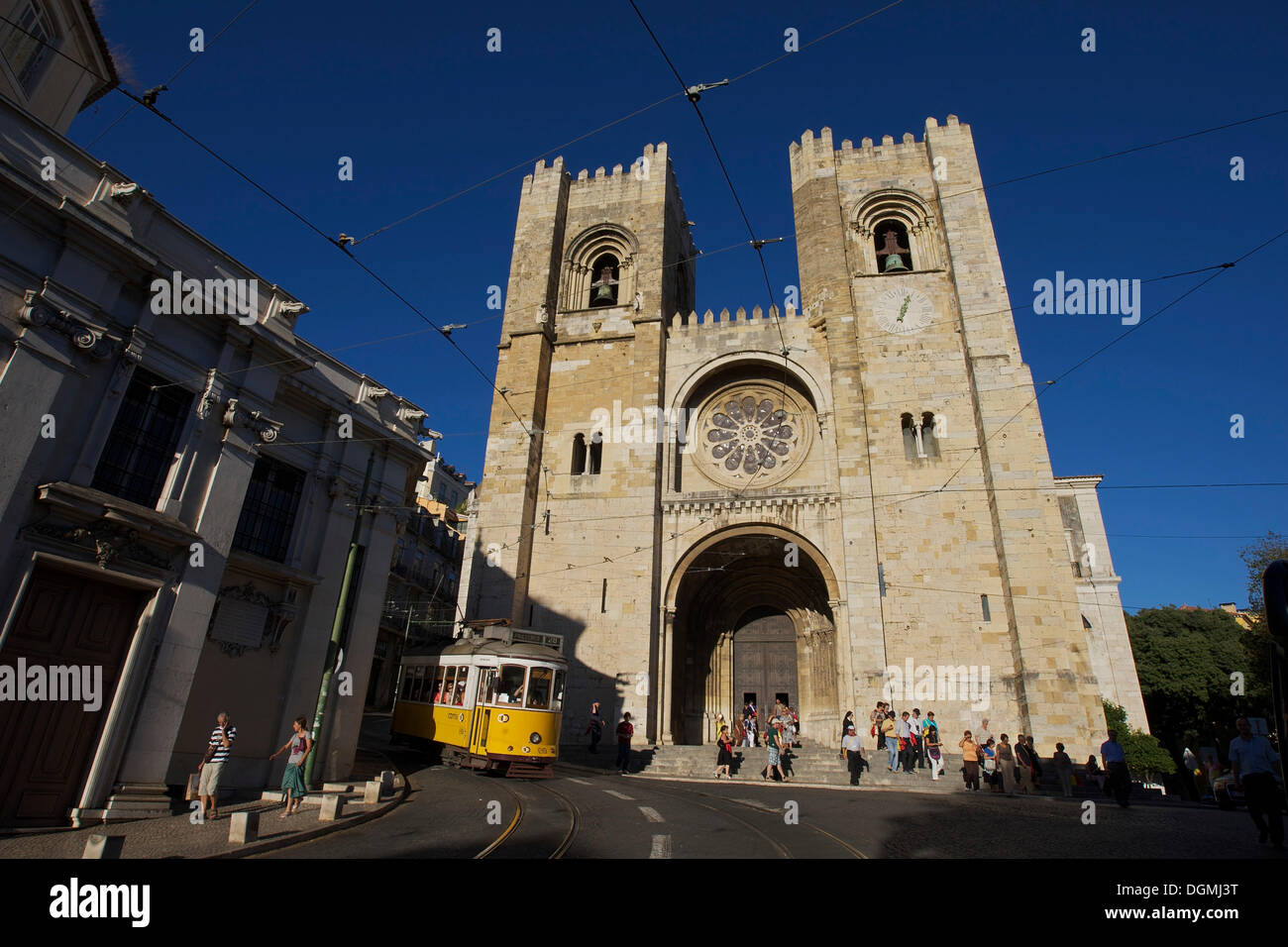 Yellow tram in front of the Sé Cathedral or Catedral Sé Patriarcal, Lisbon, Portugal, Europe Stock Photo