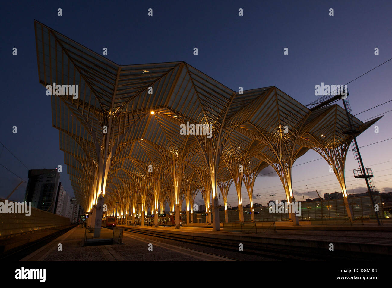 Train station Gare do Oriente at dusk, designed by architect Santiago Calatrava in the grounds of the Parque das Naçoes Stock Photo