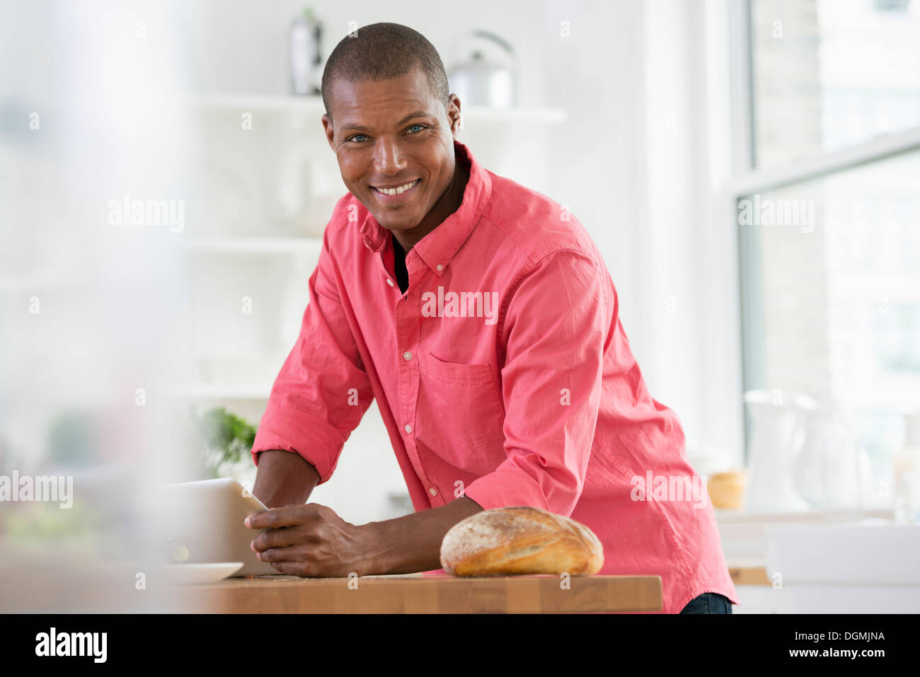 Man in pink shirt hi-res stock photography and images - Alamy