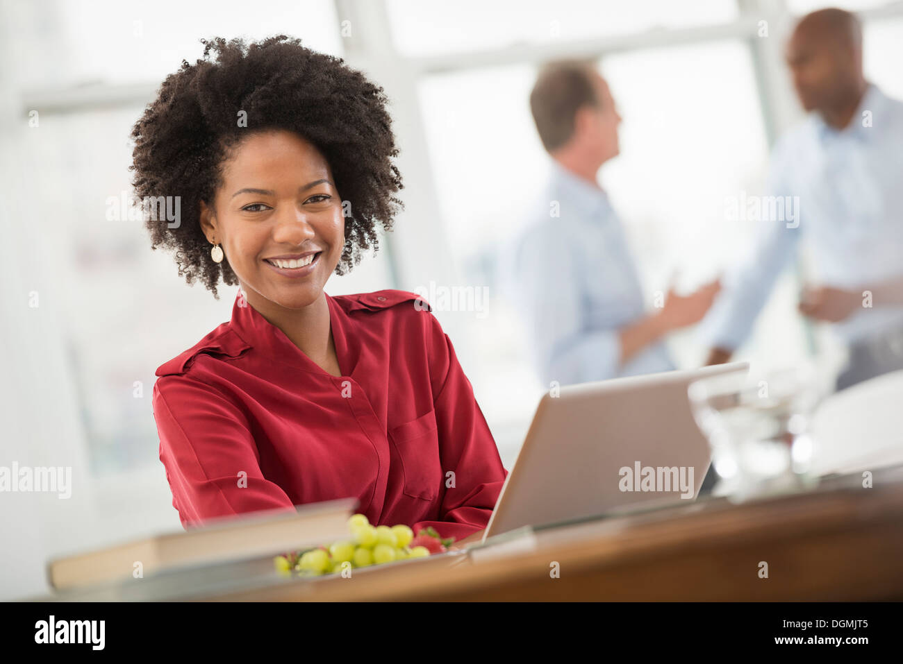 Seated african woman hi-res stock photography and images - Alamy