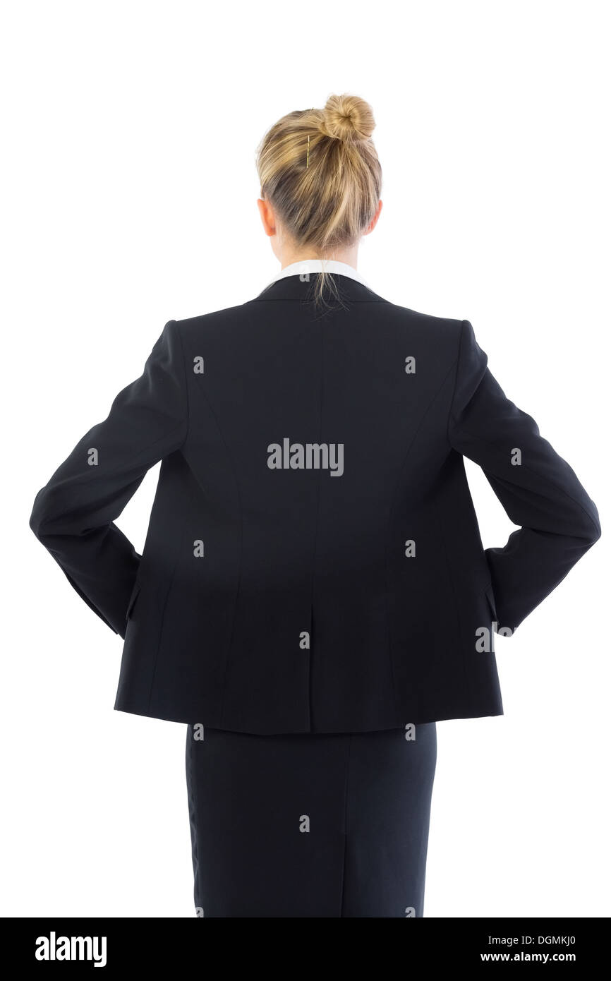 Rear view of young blonde businesswoman posing Stock Photo