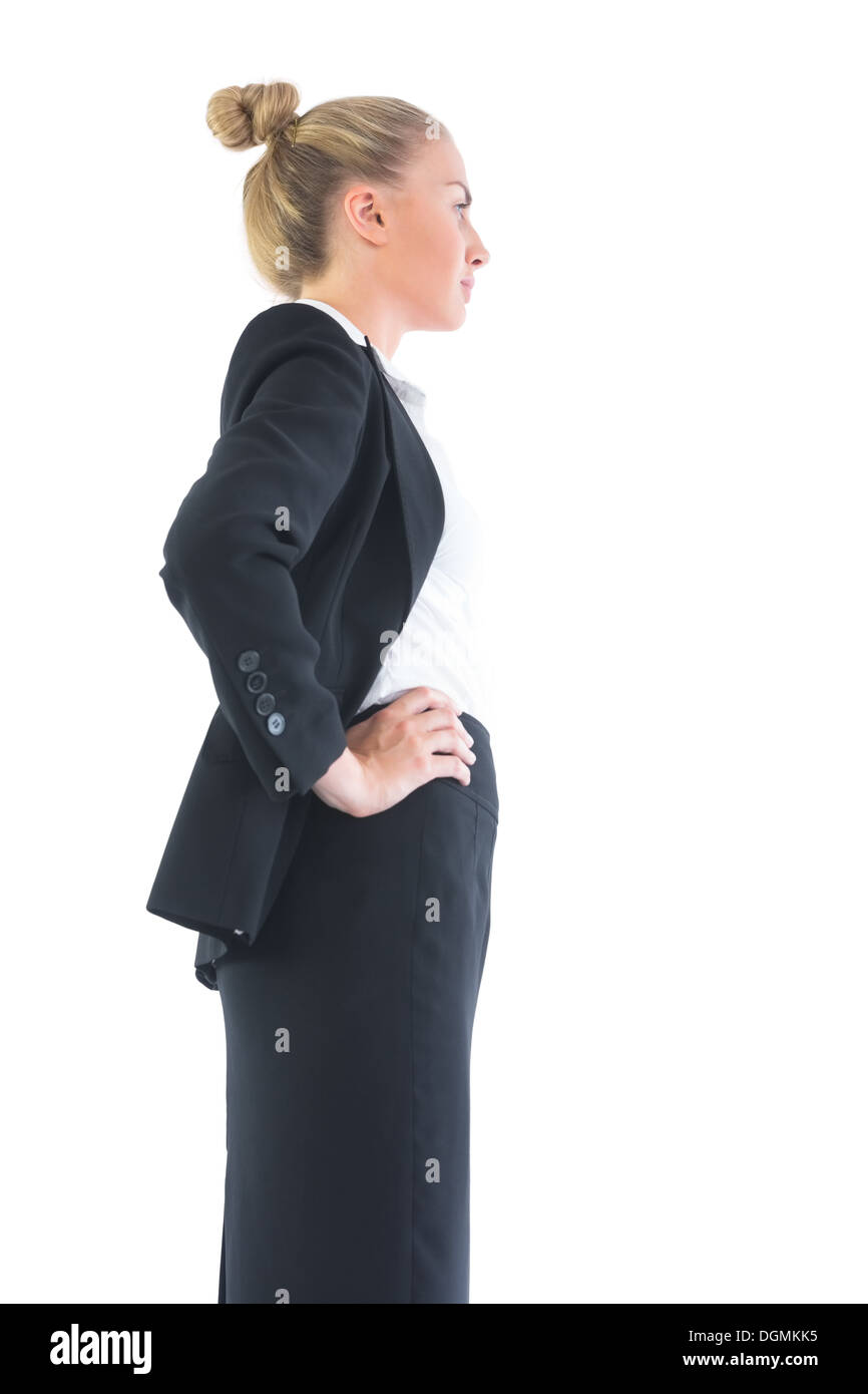 Low angle profile view of young businesswoman posing Stock Photo
