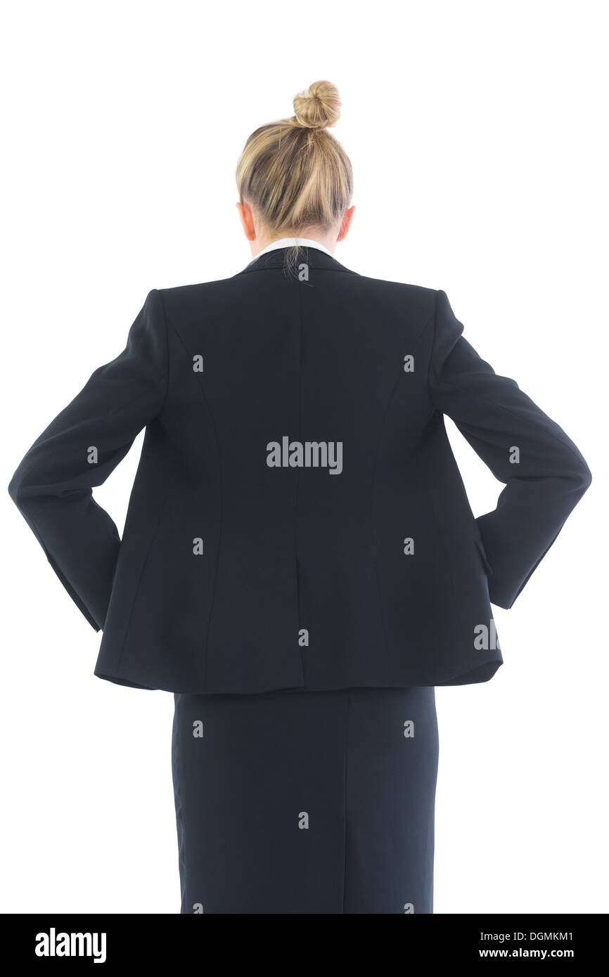 Low angle rear view of young businesswoman posing Stock Photo