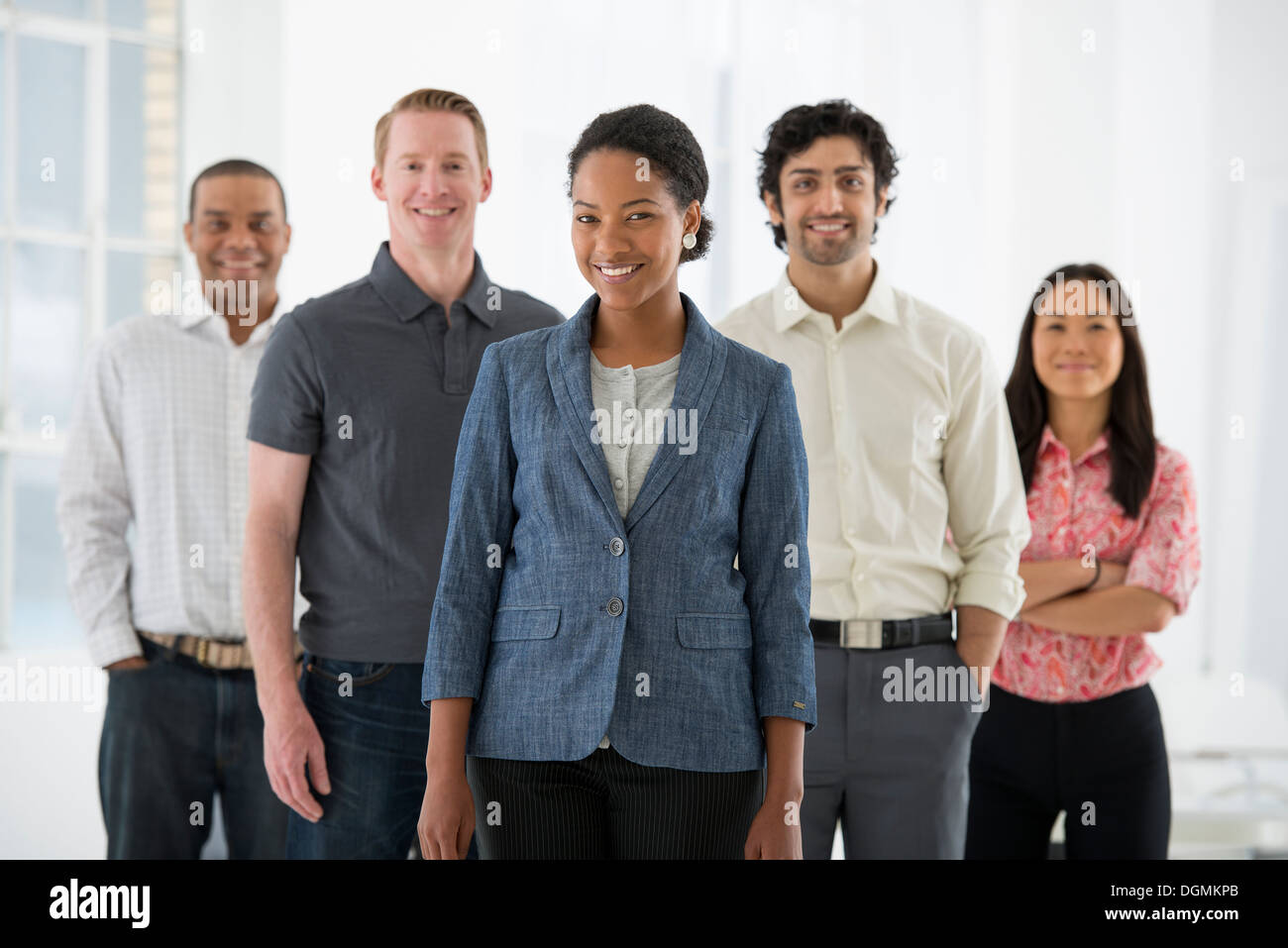 Business. A team of people, a multi ethnic group, men and women in a group. Stock Photo