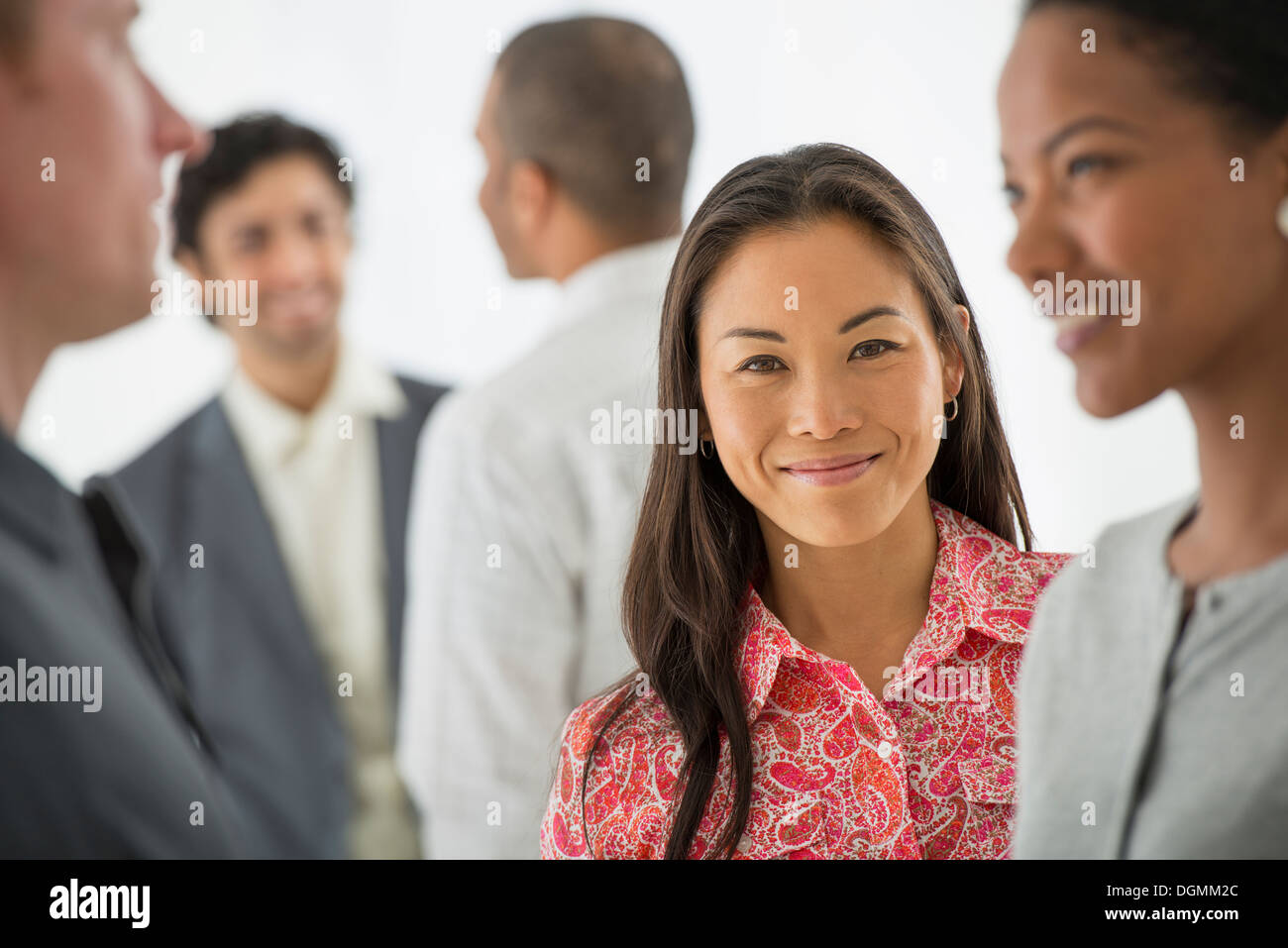 Business. A team of people, a multi ethnic group, men and women in a group. Stock Photo