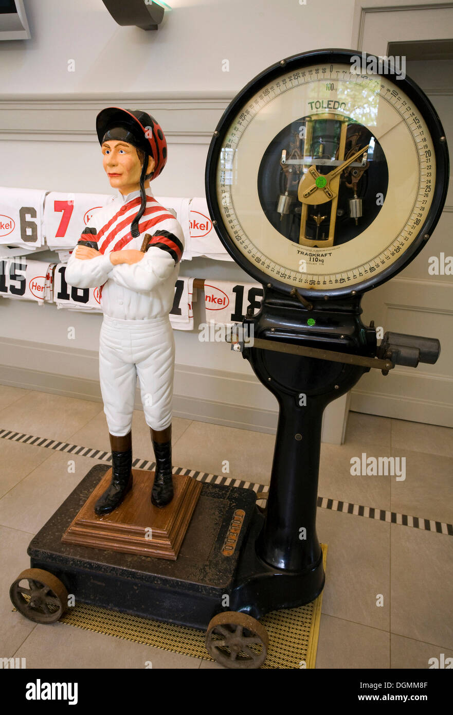 Figure of a jockey standing on historical scales, Grafenberg racecourse, Duesseldorf, North Rhine-Westphalia Stock Photo