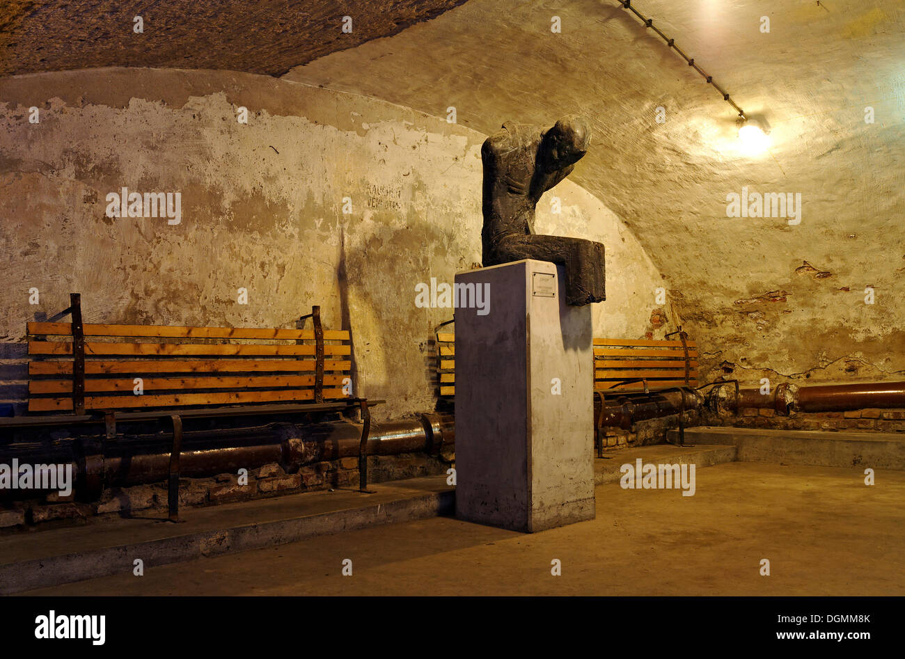 Historic air raid shelter, with sculpture by the sculptor Thomas Duttenhoefer, memorial for Nazi victims, Duesseldorf Stock Photo