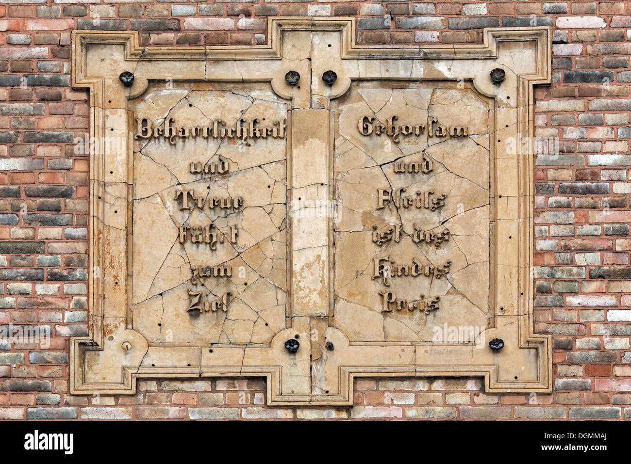 Perseverance, loyalty, obedience, diligence, plaque with epigram on school in Neinstedt, Harz, Saxony-Anhalt Stock Photo