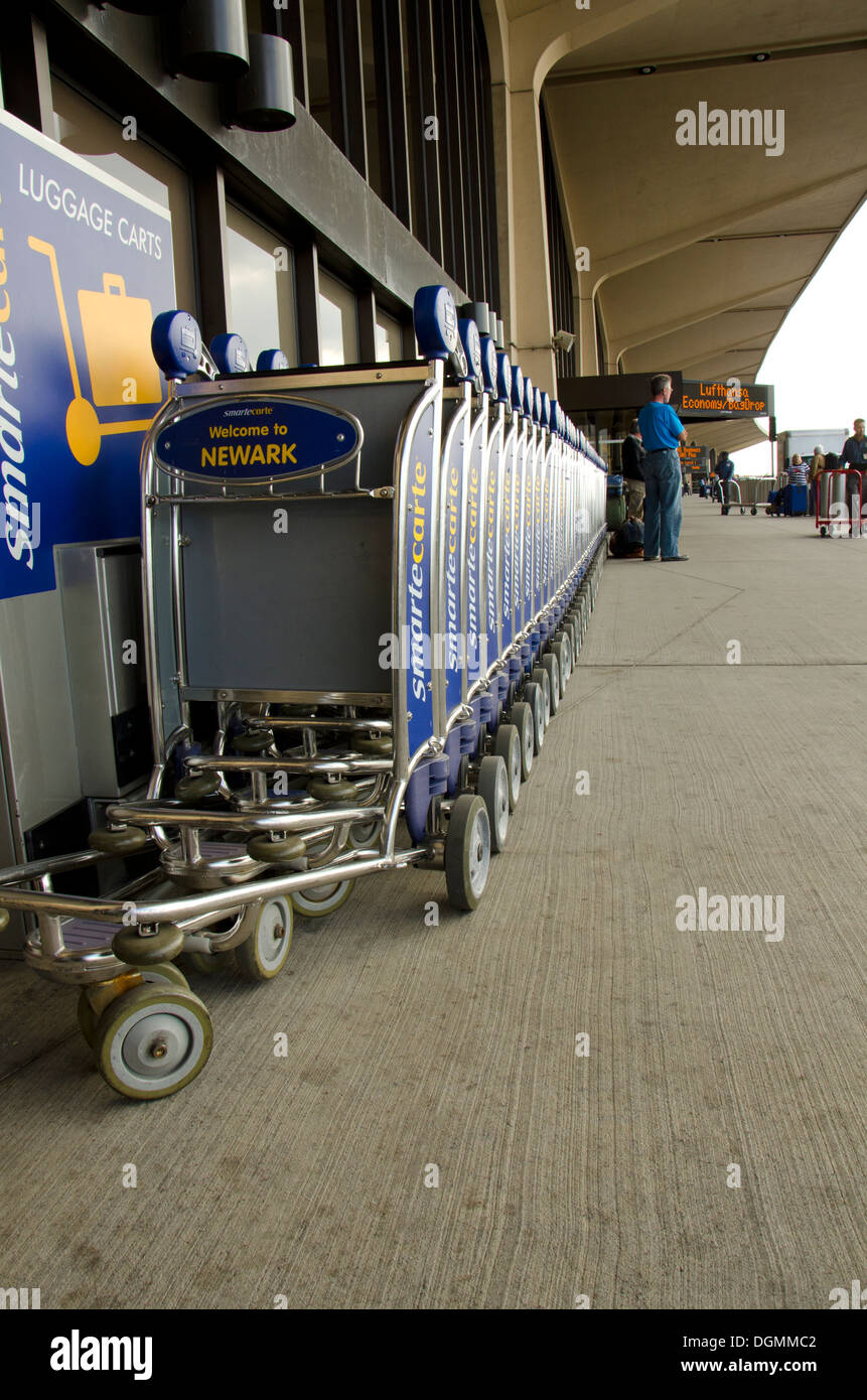 Row of Baggage carts at departures Newark airport. New jersey, USA