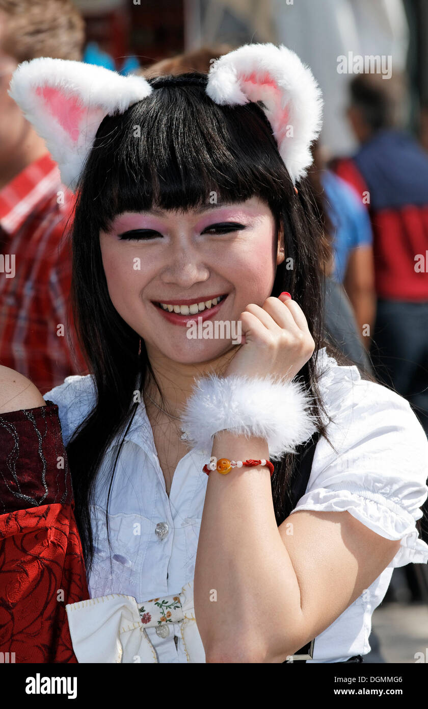 Japanese girl with fuzzy rabbit ears smiling friendly, Japantag Japan Day, Duesseldorf, North Rhine-Westphalia Stock Photo