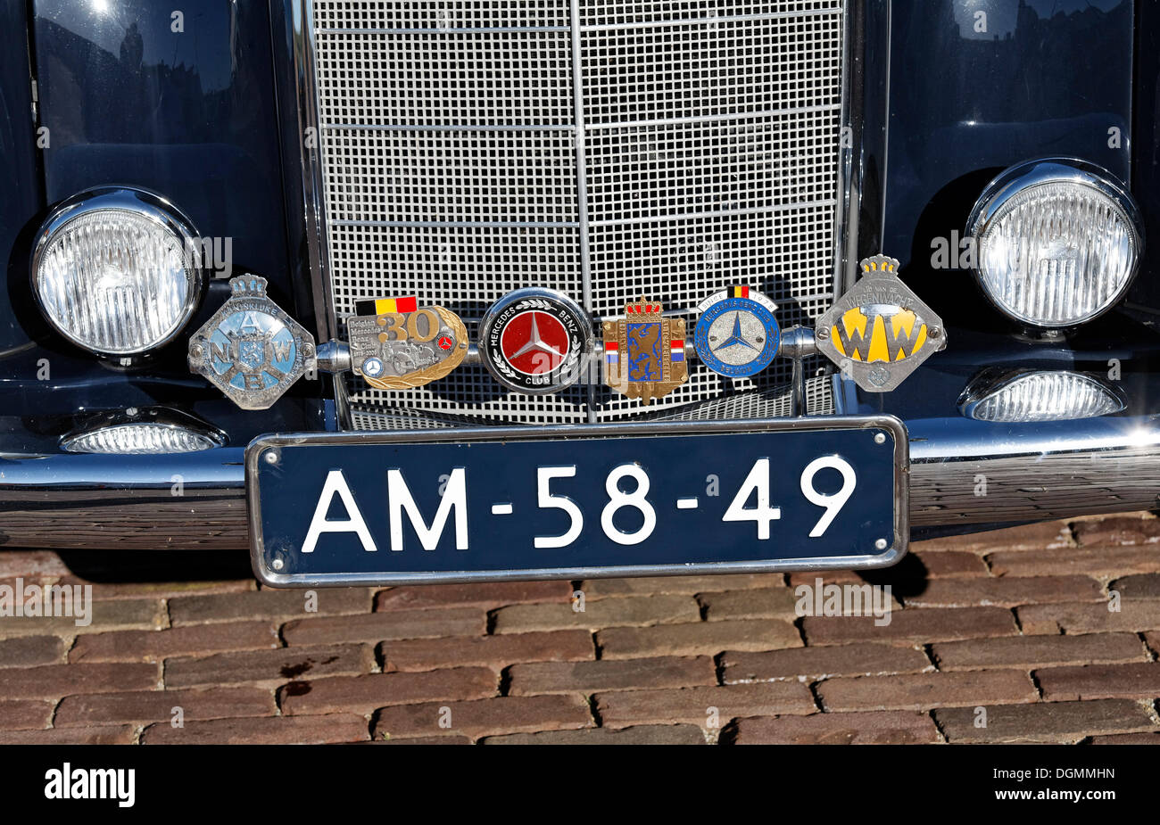 Badges Of Several Automobile Clubs On The Bumper Of A Mercedes Dutch Number Plate Netherlands Benelux Europe Stock Photo Alamy