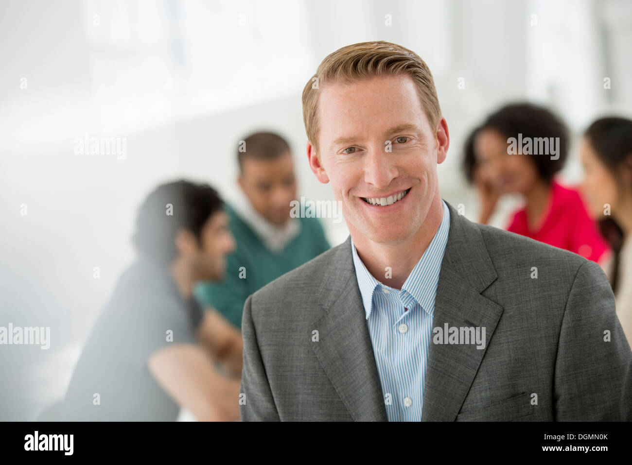 Business meeting. A man smiling confidently. Stock Photo