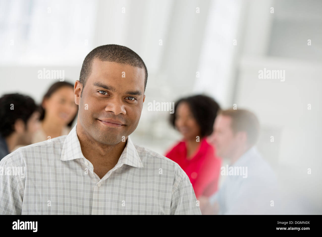 Business meeting. A man smiling confidently. Stock Photo