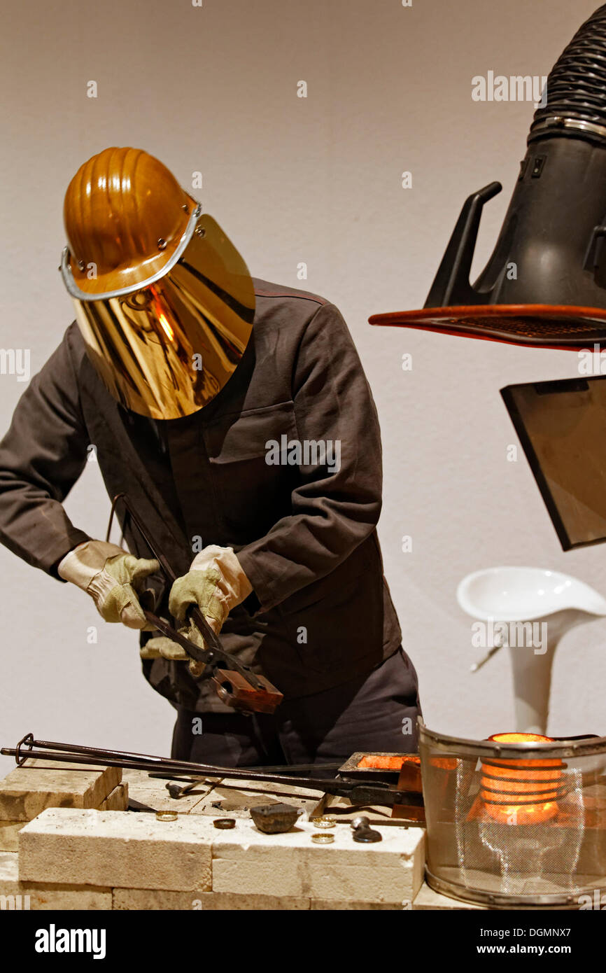 Steelworker wearing a gold plated protective mask, steel recycling demonstration, IdeenPark 2012, a technology and education Stock Photo