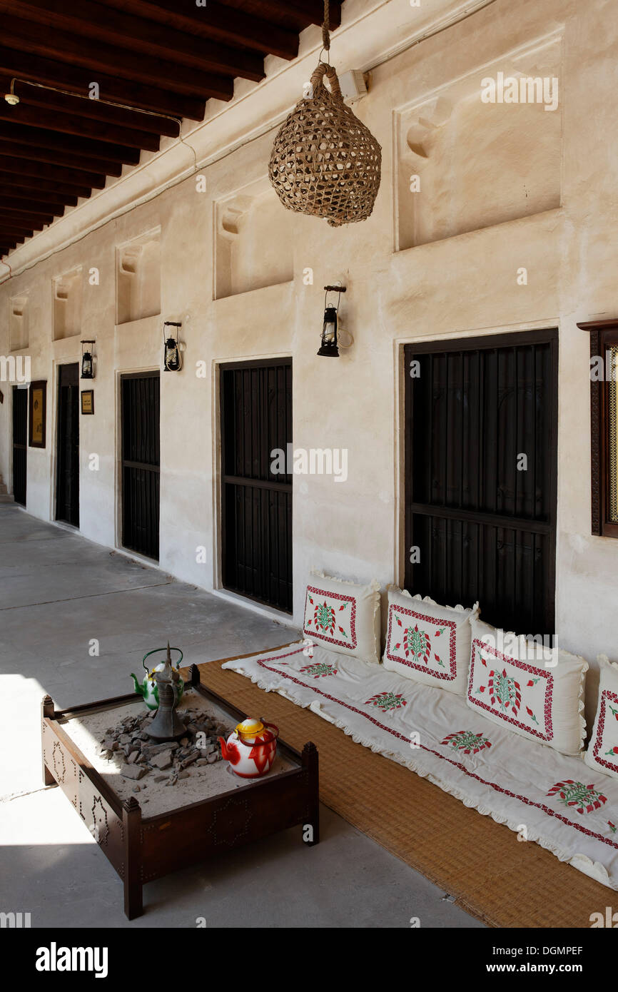 Veranda with a seating area on the ground, typical residential dwelling of the Emirates, Heritage House, Dubai Stock Photo