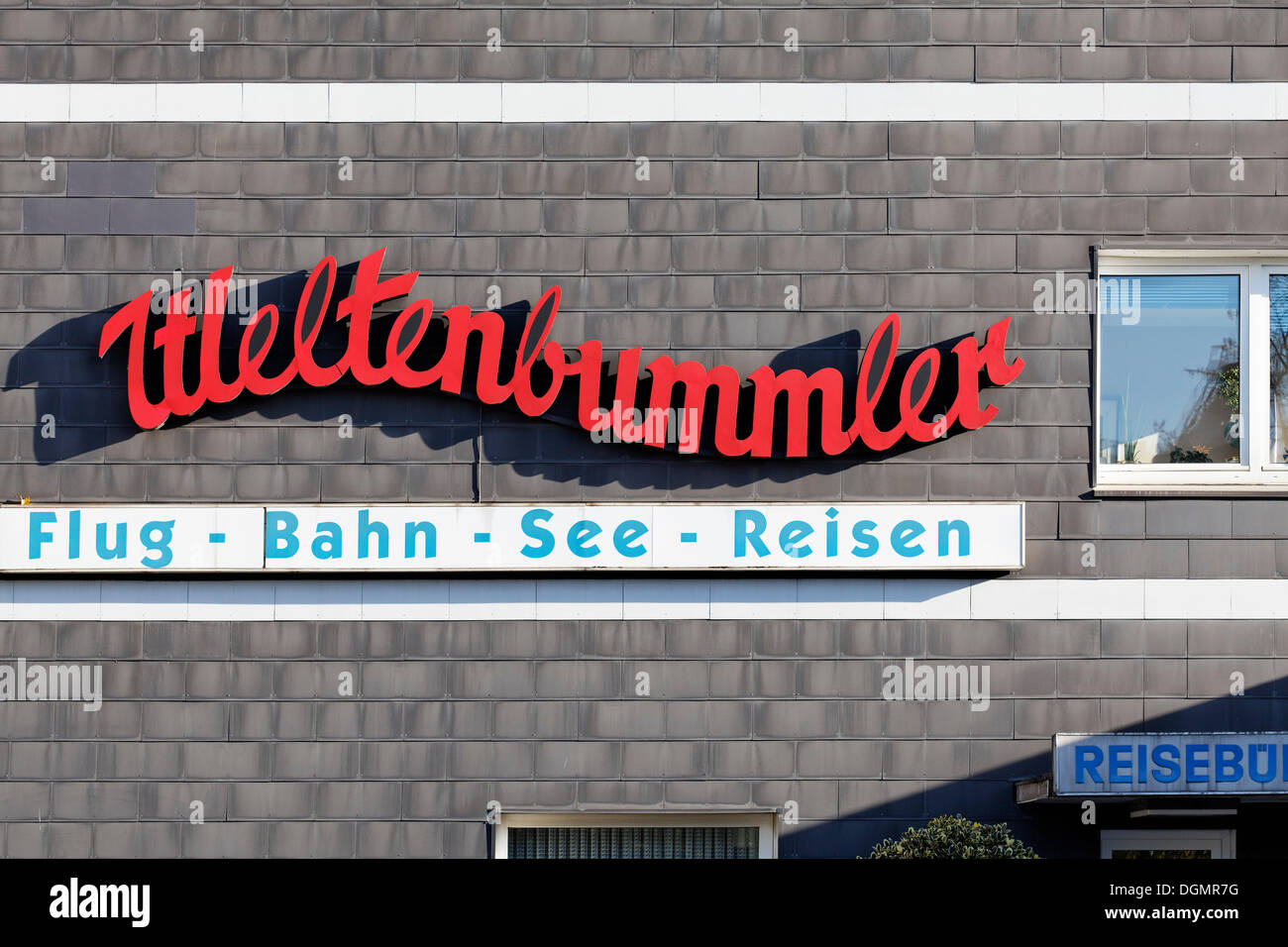 Weltenbummler, German for Globetrotter, old-fashioned lettering on a travel agency, Duisburg-Bruckhausen, Ruhr area Stock Photo