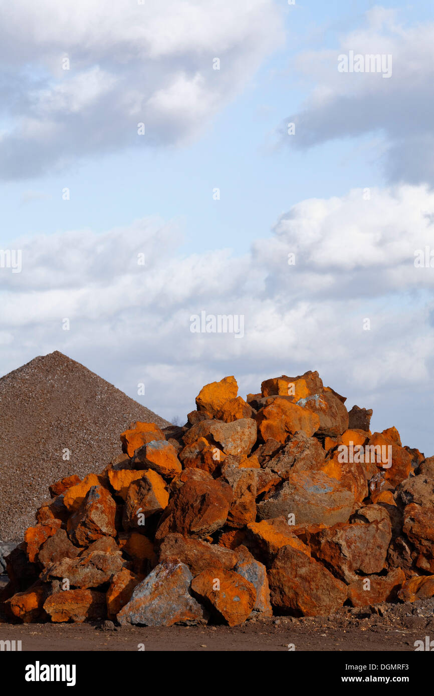 Stack of rusty ferruginous rocks waiting to be recycled, Krefeld, North Rhine-Westphalia, Germany Stock Photo