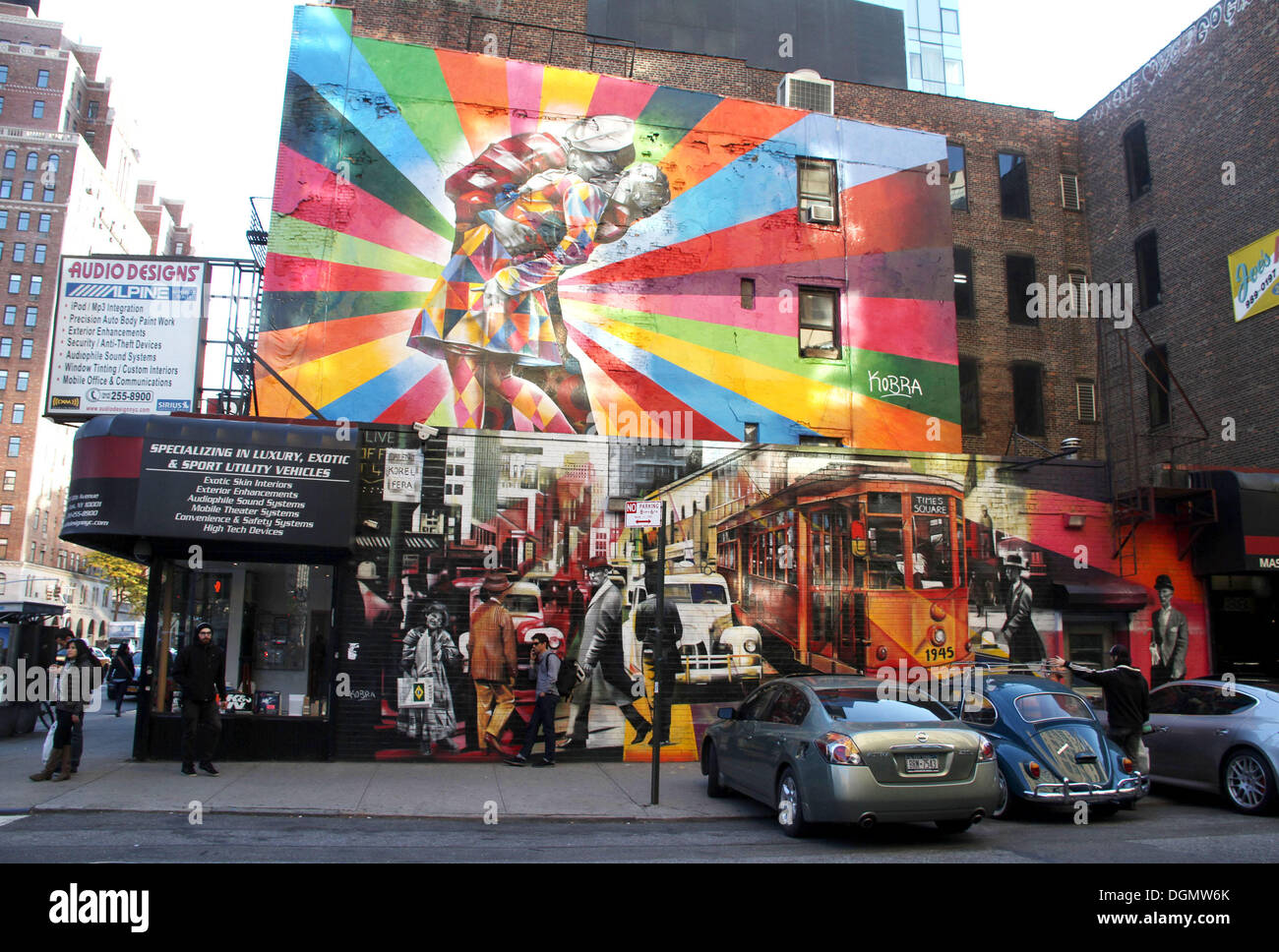 New York, New York, USA. 21st Oct, 2013. A view of the mural 'Love is in the Air' by Brazilian artist Eduardo Kobra located on West 25th Street and 10th Avenue in West Chelsea. The mural reworks the famous Eisenstaedt's 1945 'VJ in Times Square' photo. Kobra is known for his massive murals around the world infusing vibrant colors and iconic nostalgic scenes from the early 20th Century. © Nancy Kaszerman/ZUMAPRESS.com/Alamy Live News Stock Photo