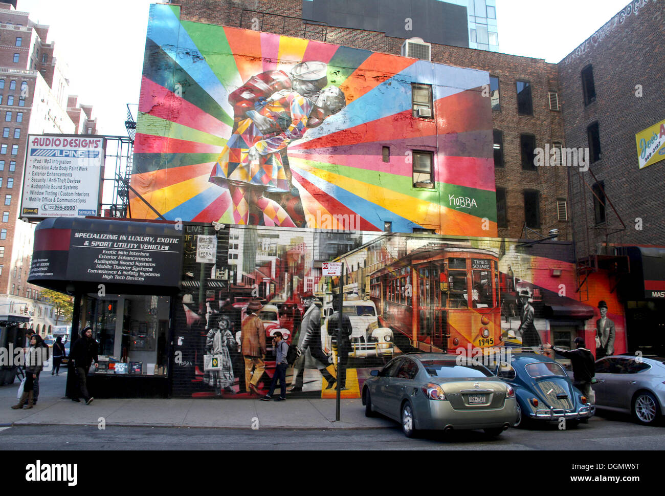 New York, New York, USA. 21st Oct, 2013. A view of the mural 'Love is in the Air' by Brazilian artist Eduardo Kobra located on West 25th Street and 10th Avenue in West Chelsea. The mural reworks the famous Eisenstaedt's 1945 'VJ in Times Square' photo. Kobra is known for his massive murals around the world infusing vibrant colors and iconic nostalgic scenes from the early 20th Century. © Nancy Kaszerman/ZUMAPRESS.com/Alamy Live News Stock Photo