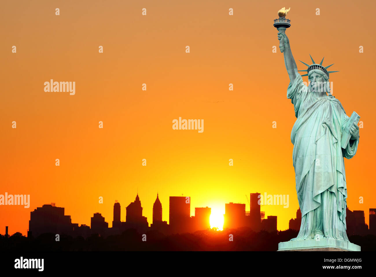Manhattan Skyline and The Statue of Liberty at Sunset, New York City ...