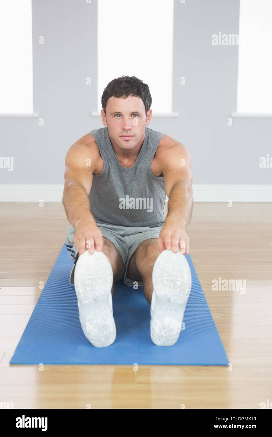 Man stretching legs hi-res stock photography and images - Alamy