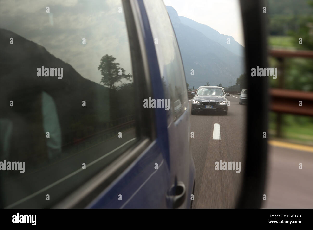 Trento, Italy, look in the right outside mirror of a car Stock Photo