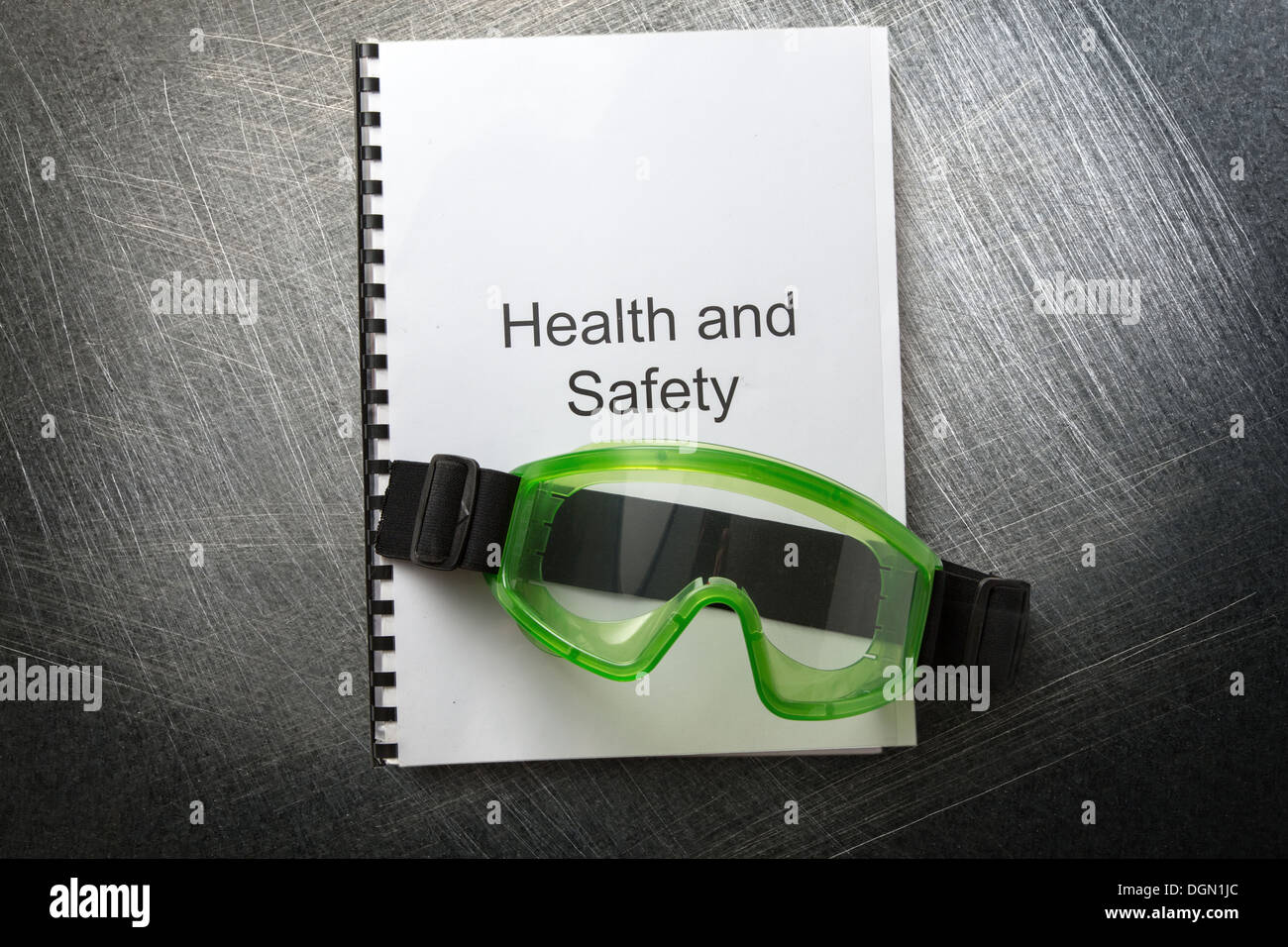 Health and safety register with goggles Stock Photo