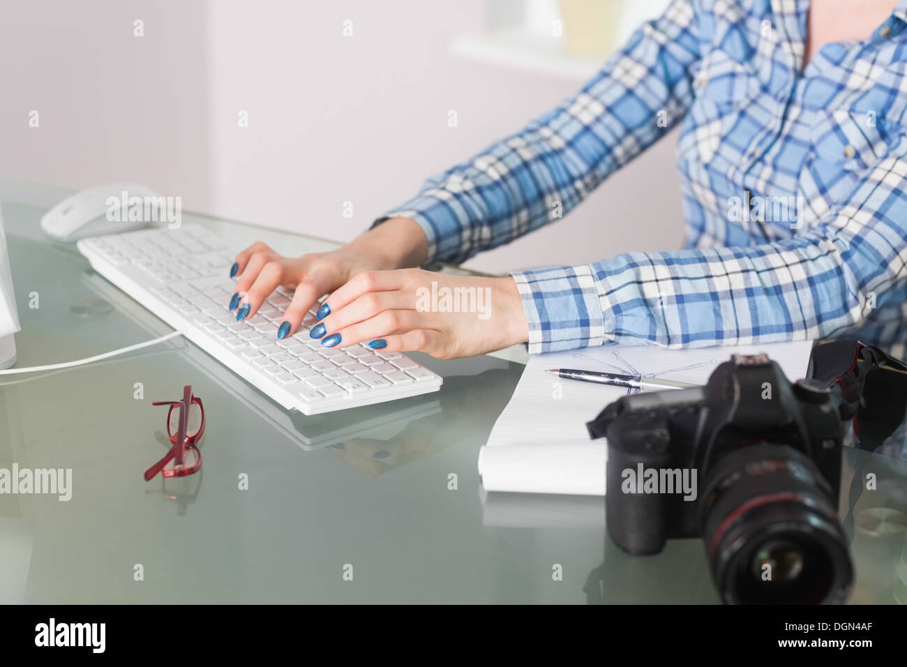Woman on keyboard hi-res stock photography and images - Alamy