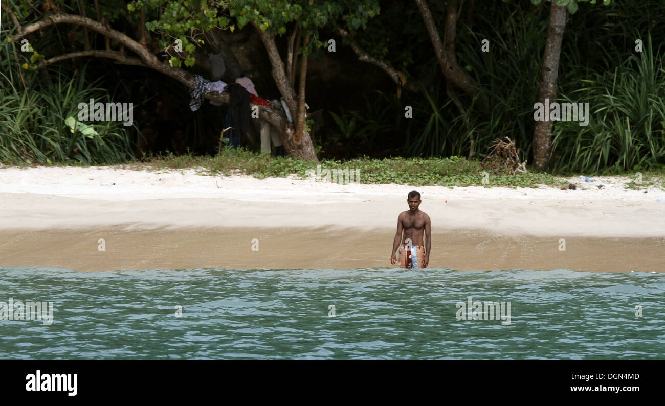 LOCAL ON JUNGLE BEACH UNAWATUNA SRI LANKA ASIA 18 March 2013 Stock Photo