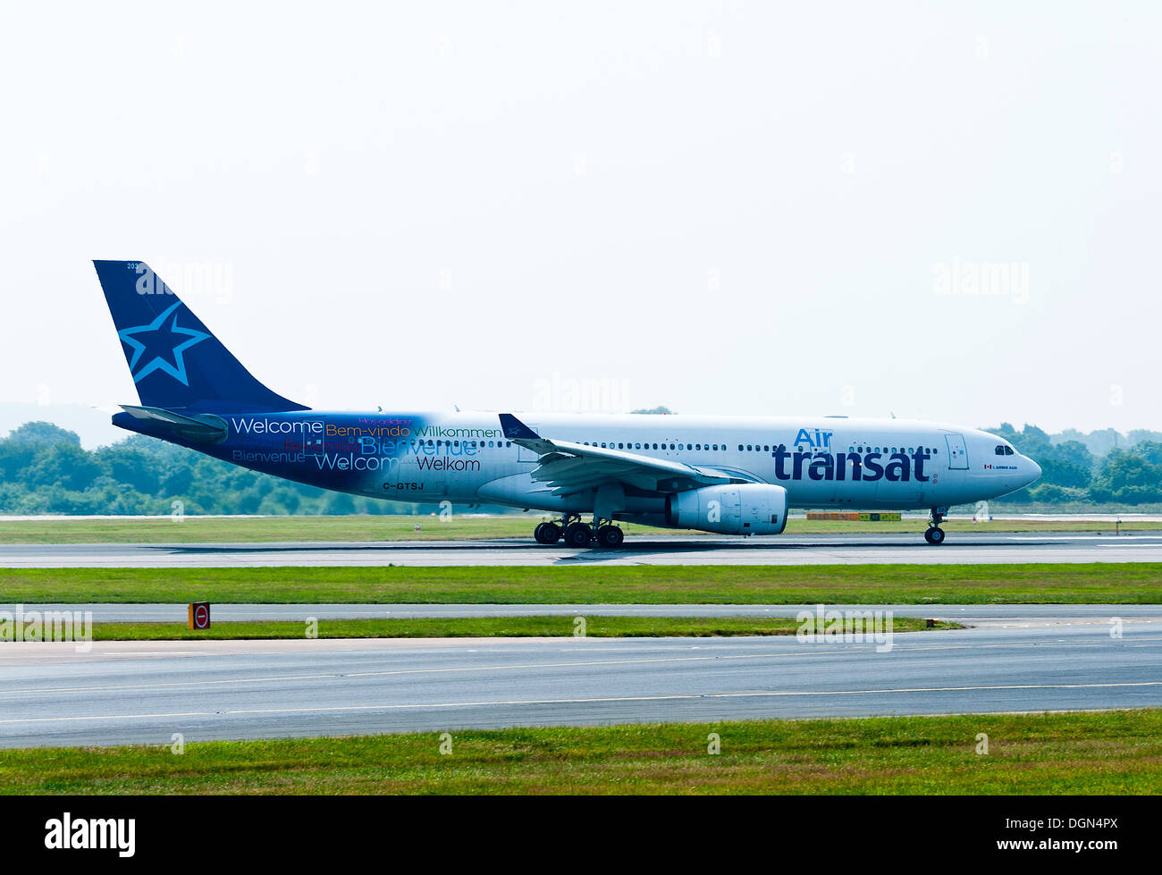 Air Transat Airbus A330 Airliner Taxiing on Arrival at Manchester International Airport England United Kingdom UK Stock Photo