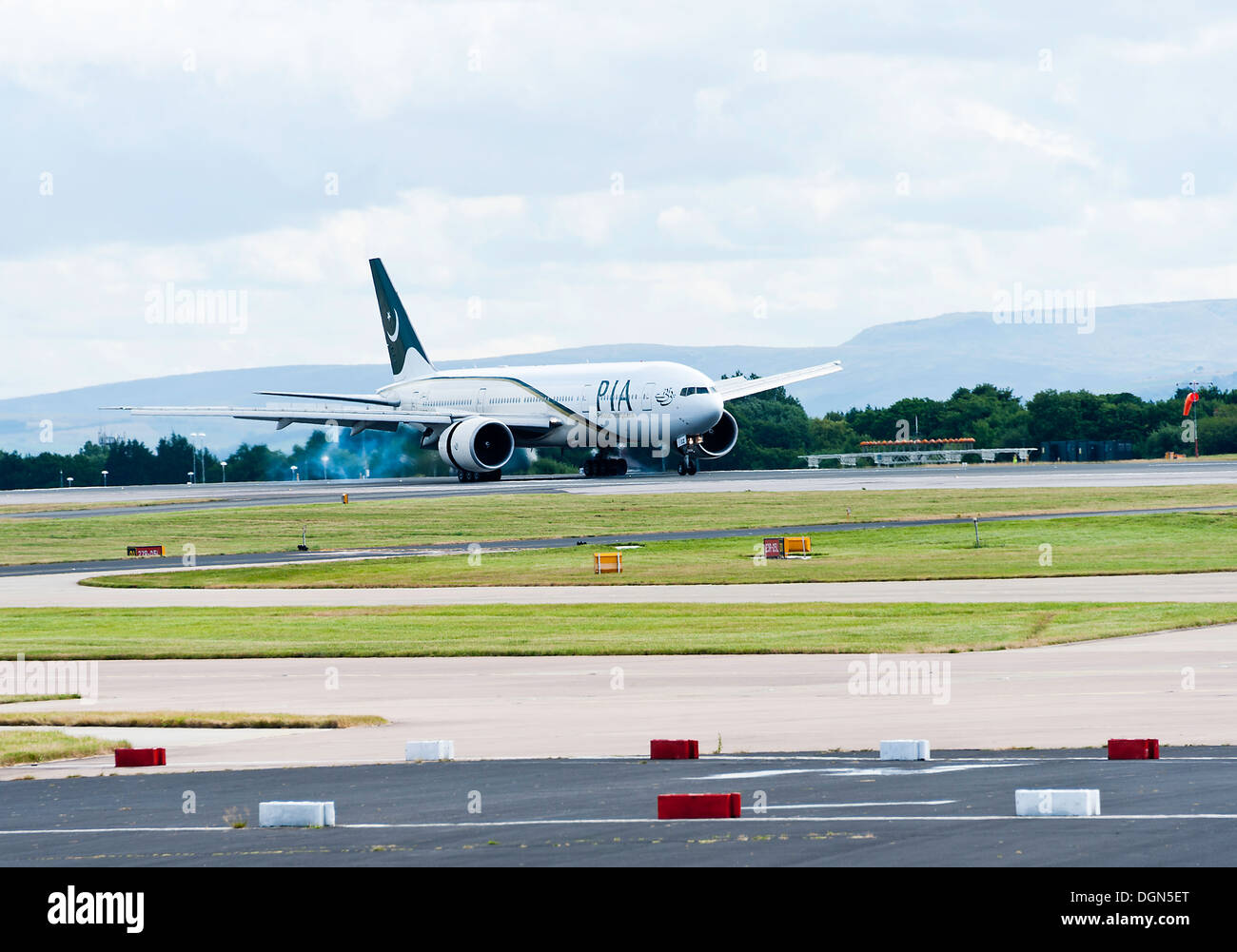 PIA Pakistan International Airline Boeing 777 Taxiing on Landing at Manchester International Airport England United Kingdom UK Stock Photo