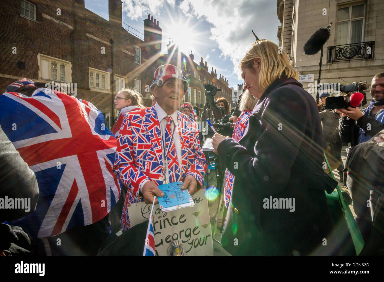 Royal fans and press wait outside the gates of St James's Palace as ...