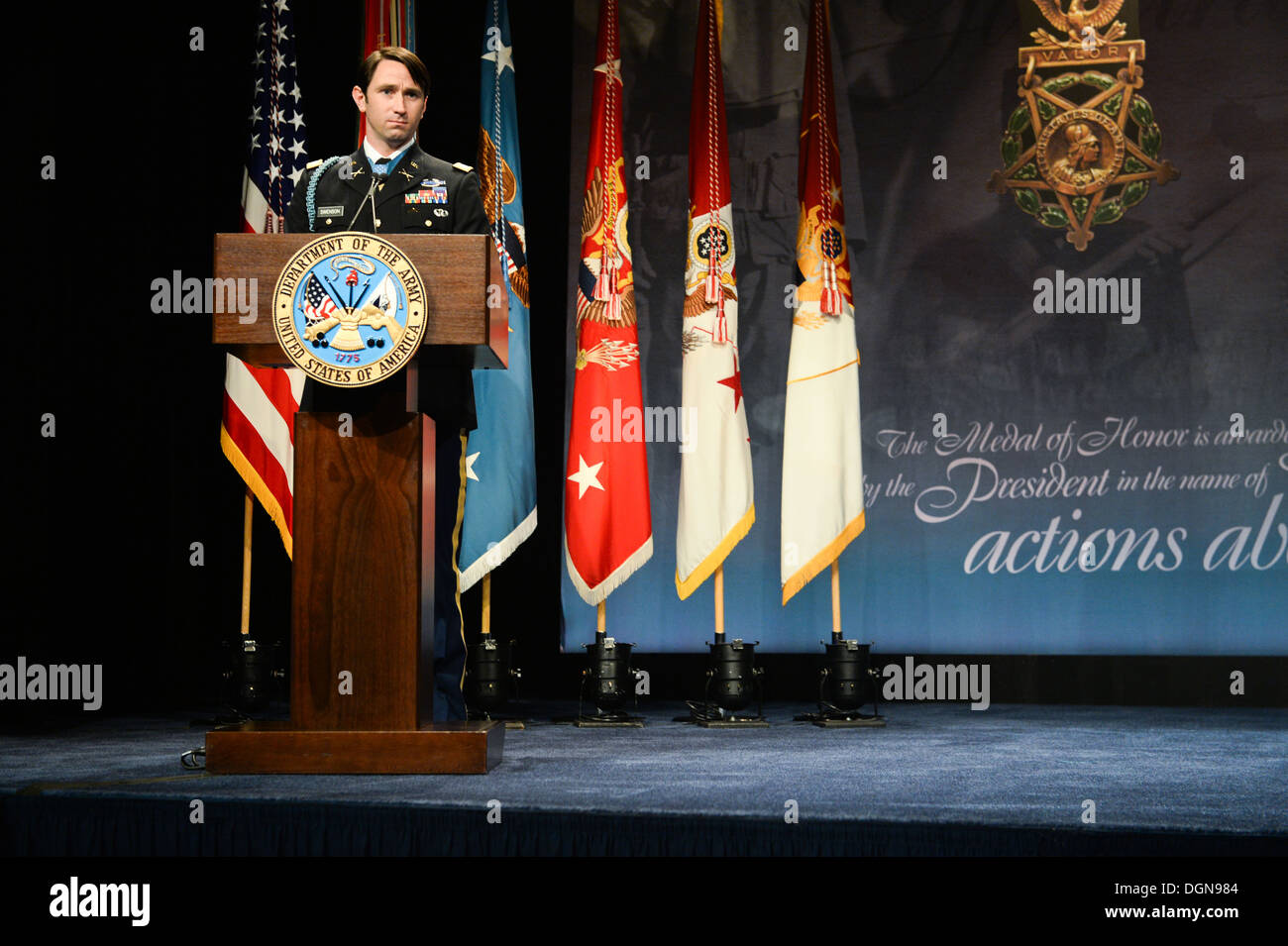 Former U.S. Army Capt. William D. Swenson, a Medal of Honor recipient, gives his speech at his Medal of Honor Induction at the Pentagon Auditorium in Washington, D.C., Oct 16, 2013. Stock Photo
