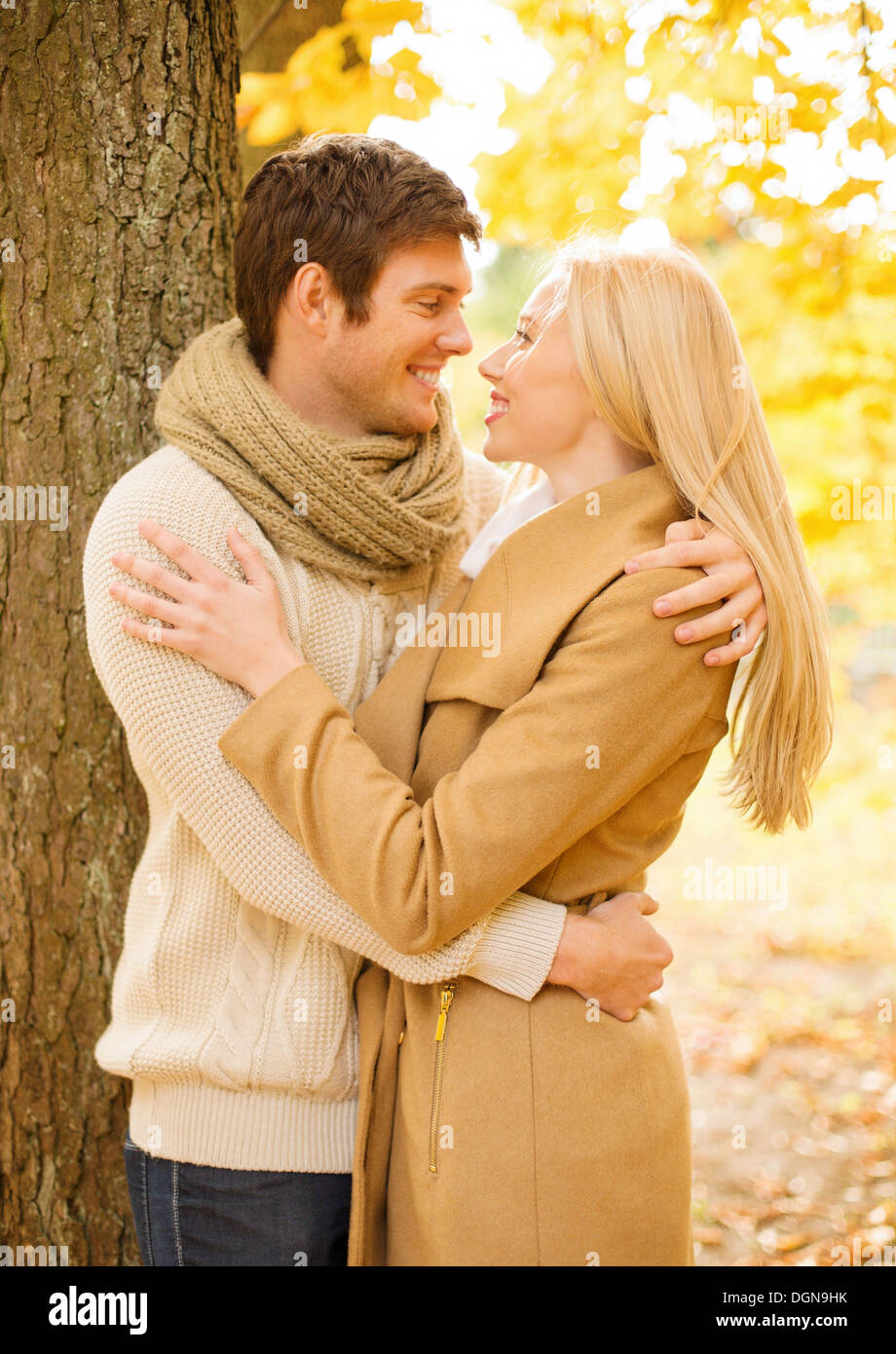 romantic couple kissing in the autumn park Stock Photo - Alamy