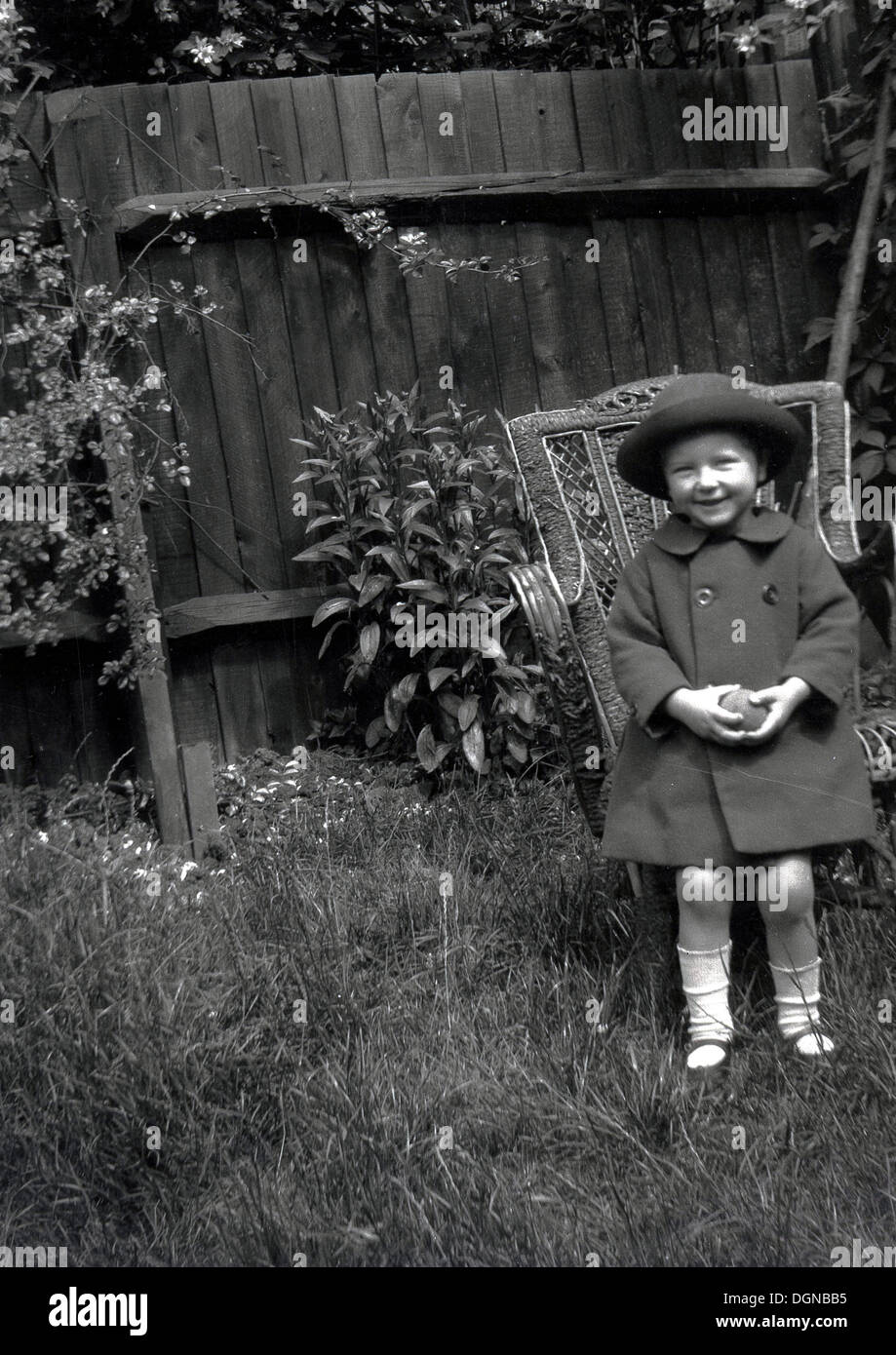 Historical image from the 1930s of a smartly dressed little girl ...