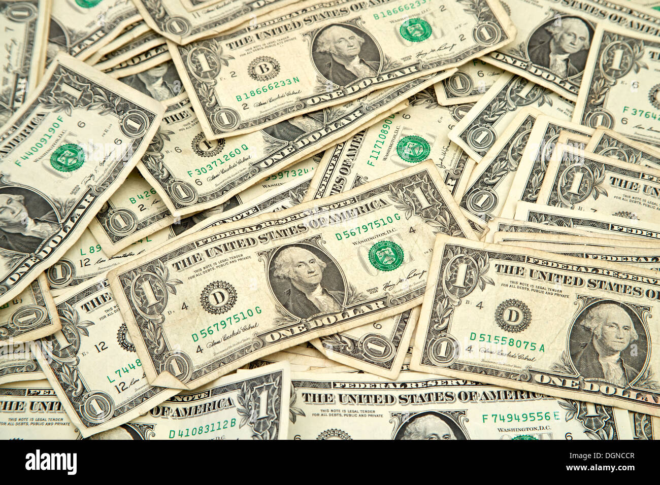 Pile of American money spread out Stock Photo - Alamy
