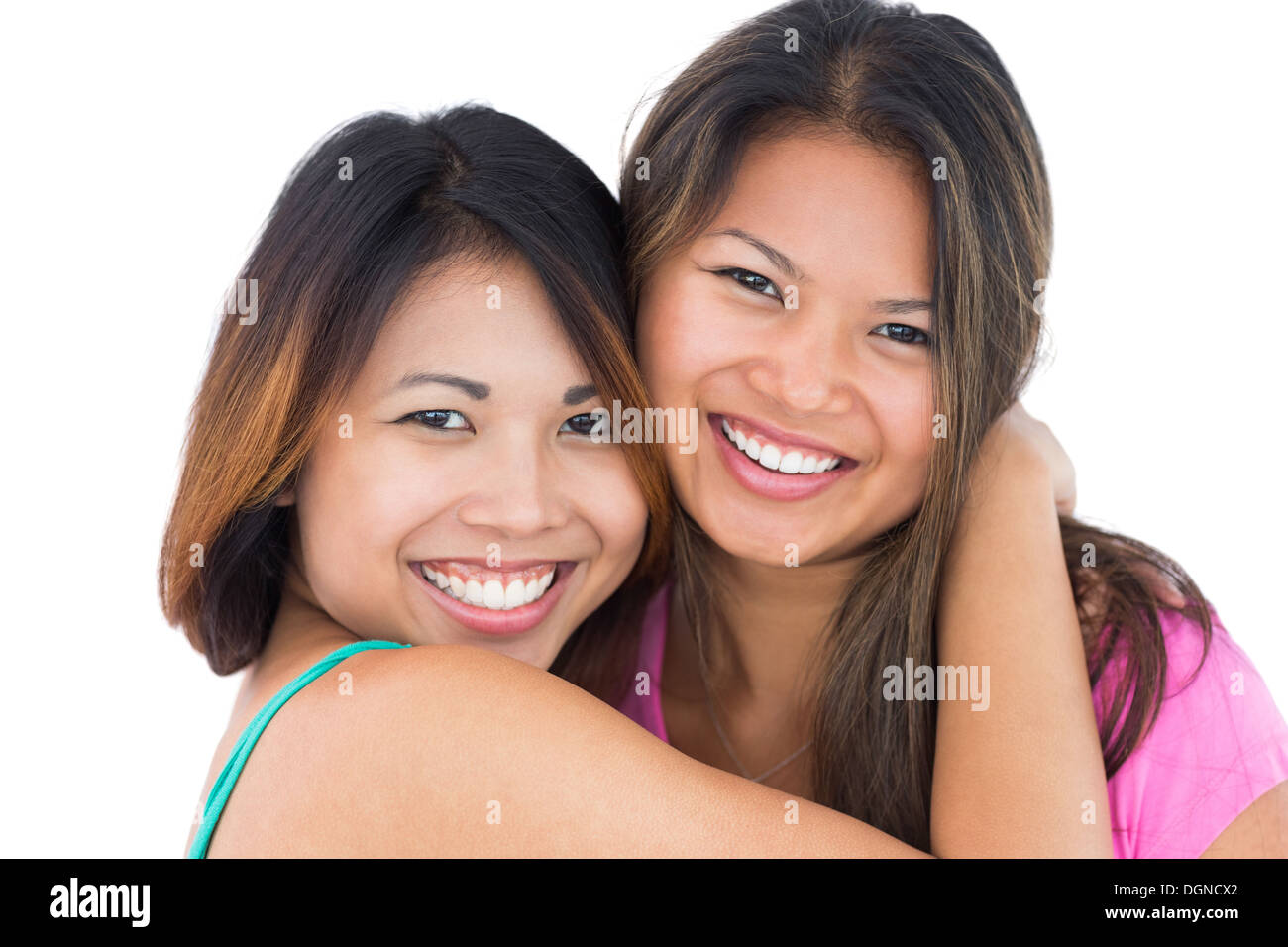 Two pretty sisters embracing each other Stock Photo