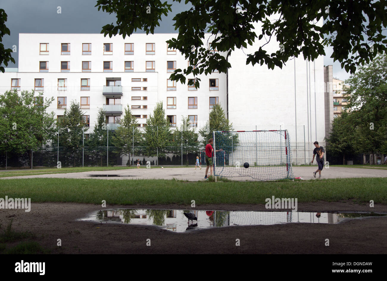 Warsaw, Poland, boys play football in their spare time on a school playground Stock Photo