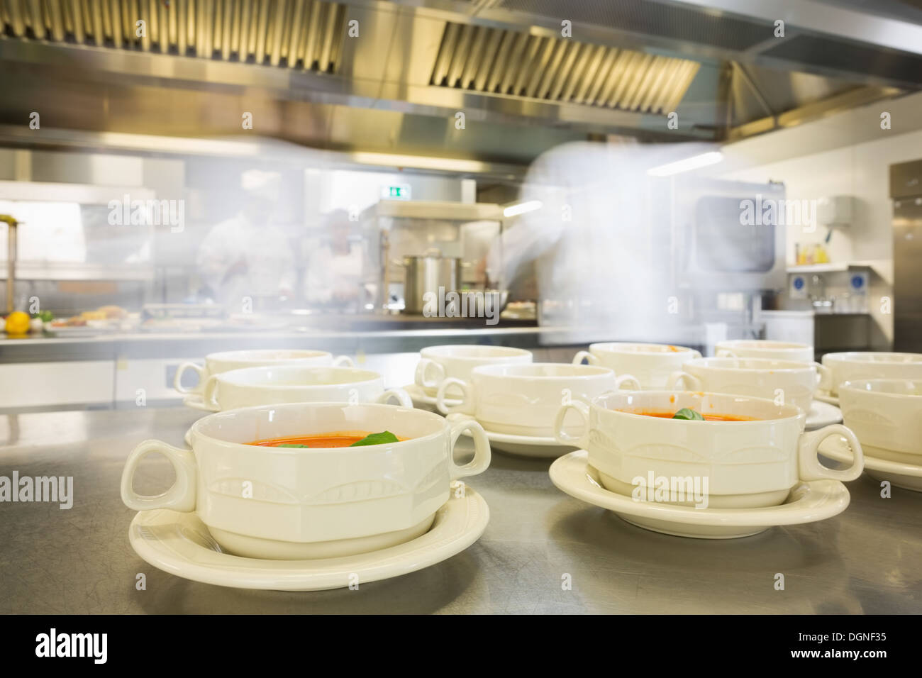 Bowls filled with hot soup Stock Photo Alamy
