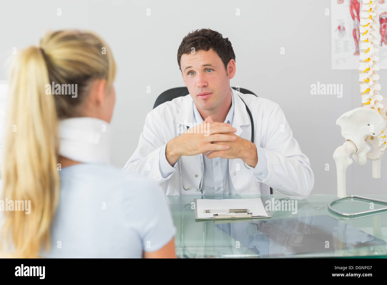 Concerned doctor having an appointment with a patient Stock Photo