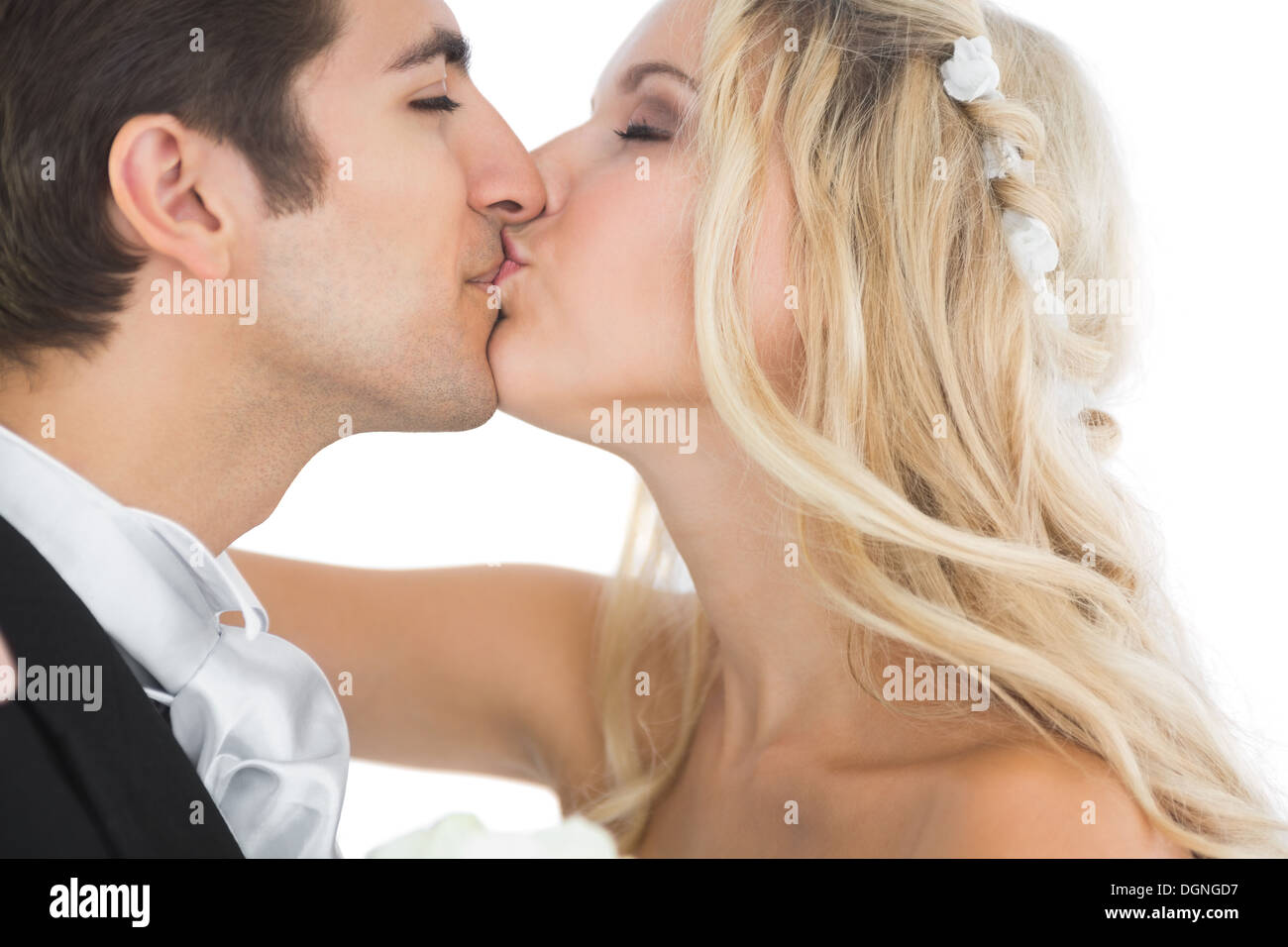 Attractive married couple kissing each other Stock Photo